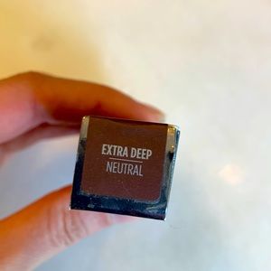 UD All Nighter waterproof full-coverage concealer. 

Shade: Extra deep neutral